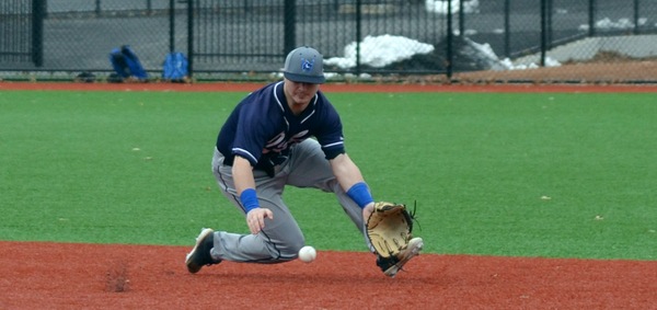 Colin Dunn makes a sliding stop up the middle.