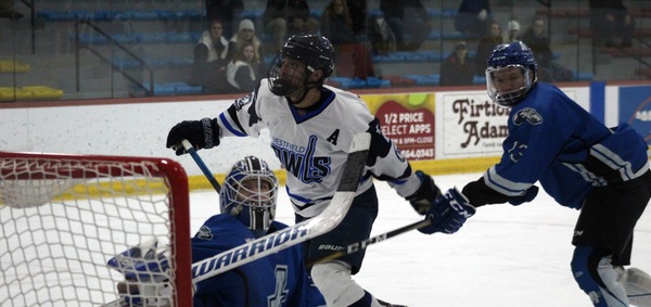 Aaron Clancy watches the puck deflect past the Assumption goal (file photo: Nate Barnes)