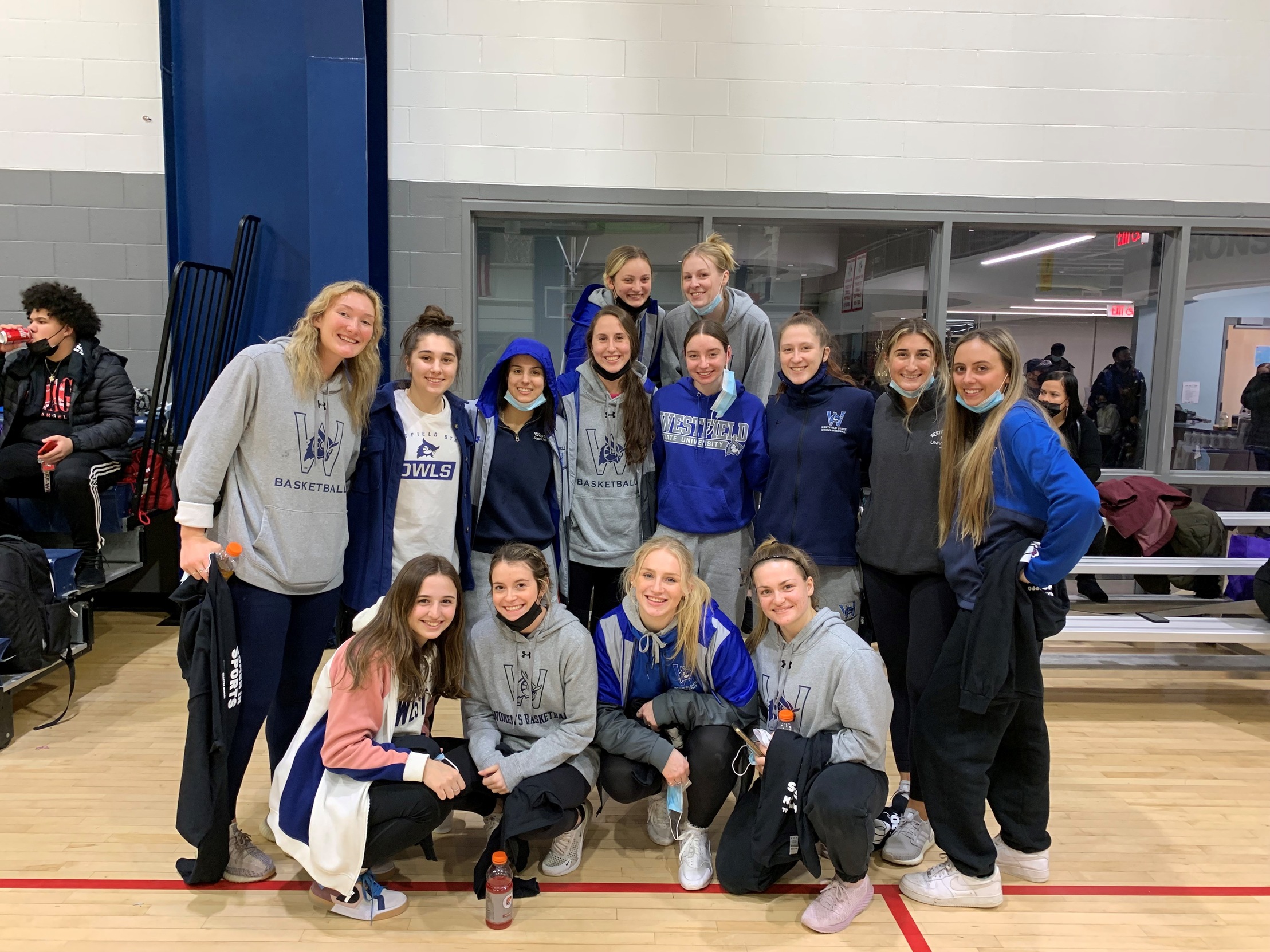 Westfield State's women's basketball team poses after volunteering at the South End Community Center in Springfield as part of National Girls And Women in Sport dat activities in Feb. 2022