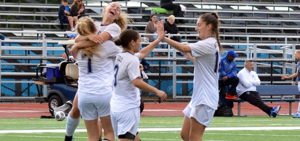 The Owls celebrate Nicole Chretien's goal early in the first half