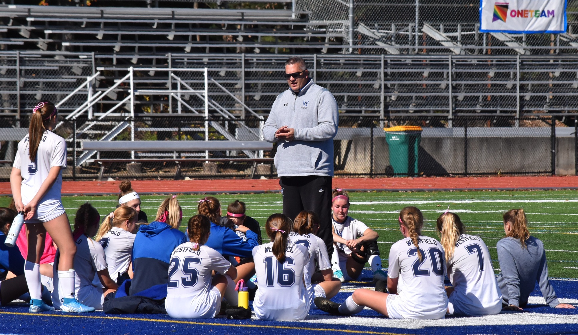 Westfield State head coach Todd Ditmar speaks to his team at halftime of a game.